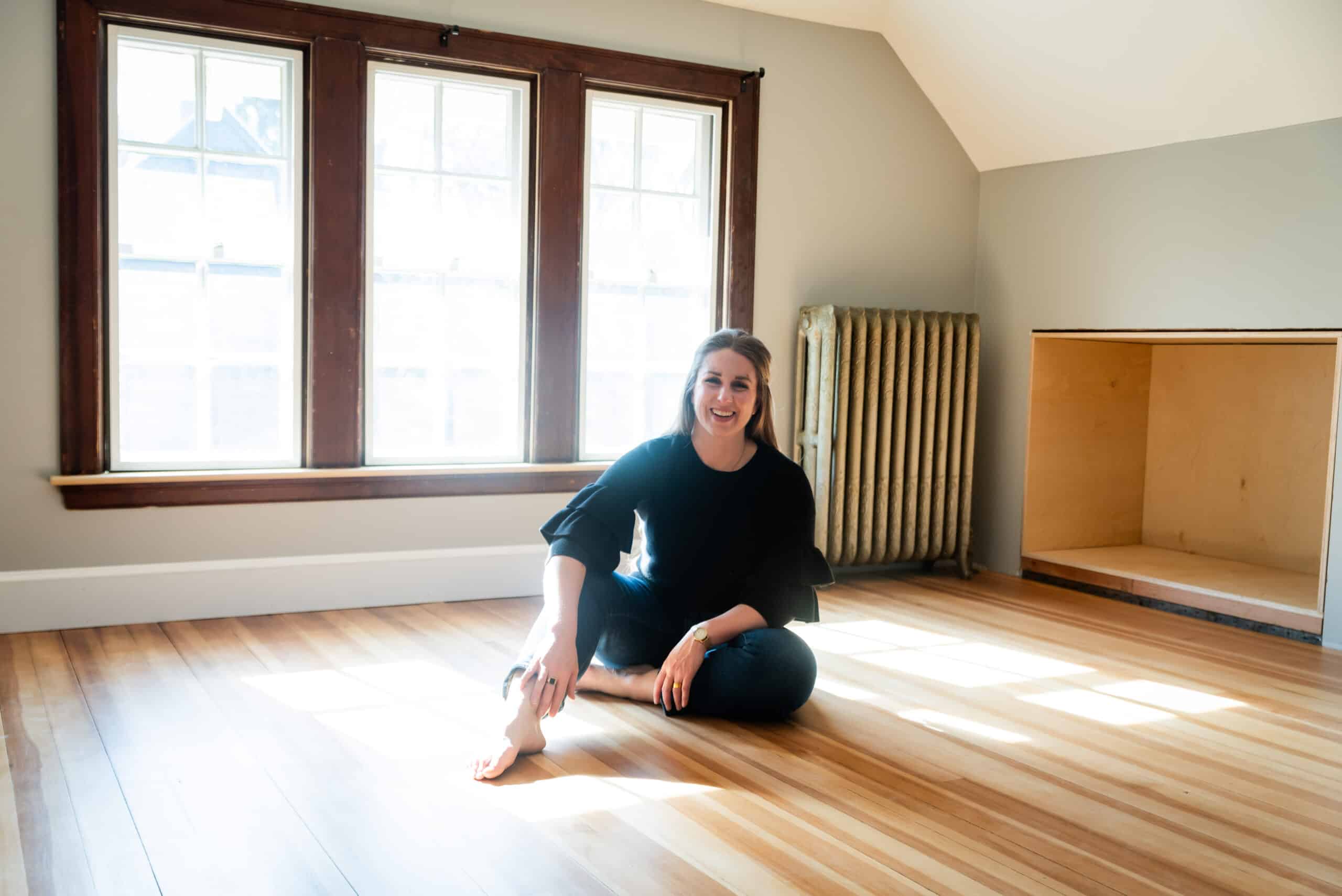 Kate sitting in floor
